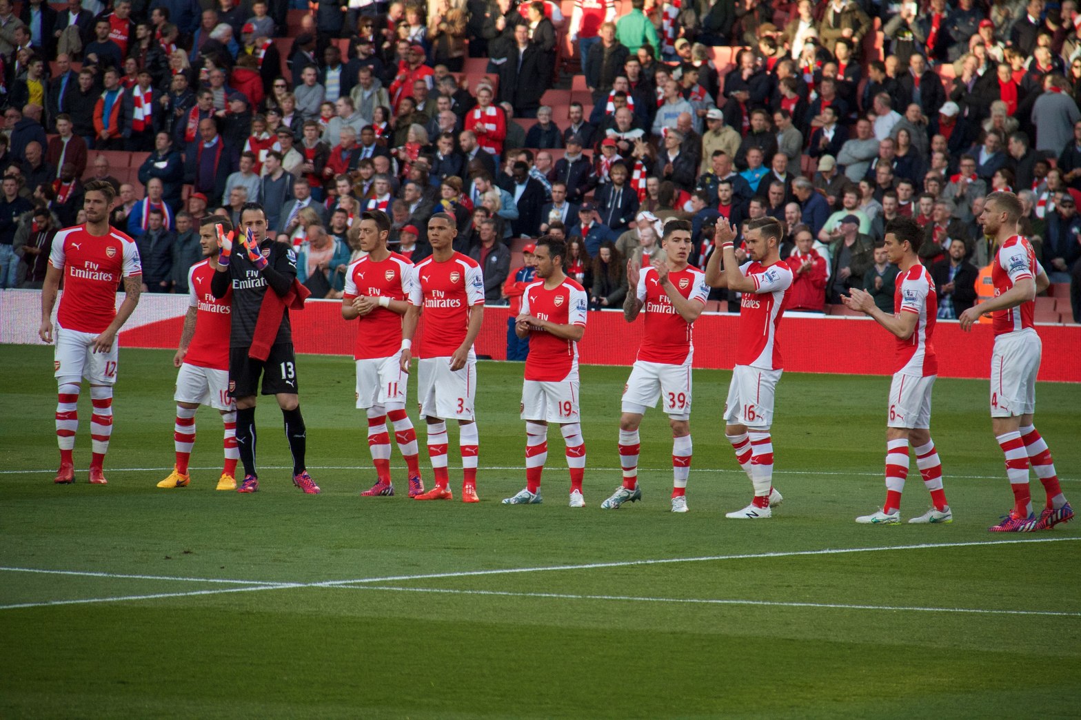 Arsenal applaud their fans